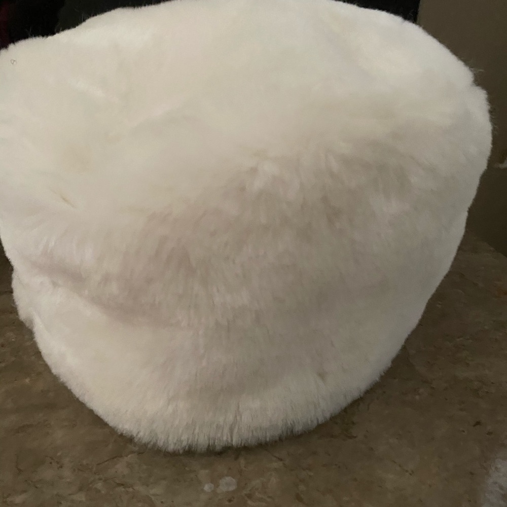 White fur like  hat